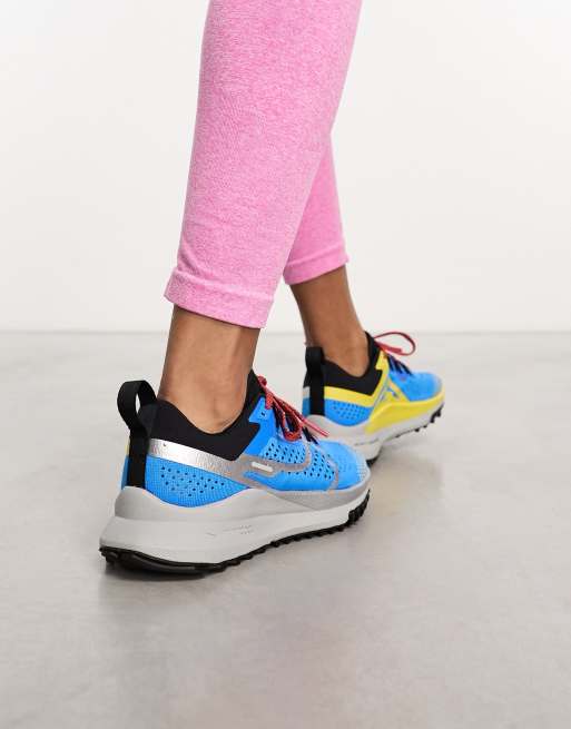 Nike blue and yellow sales trainers