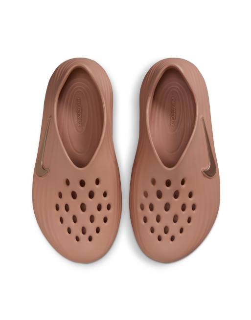 Nike Running ReactX Rejuven8 clogs in rose gold | ASOS