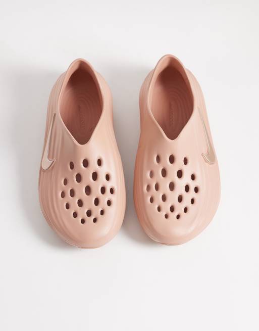 Nike Running ReactX Rejuven8 clogs in rose gold | ASOS