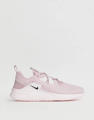 nike running renew arena trainers in pink
