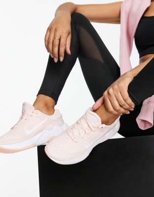 nike running renew arena trainers in pink