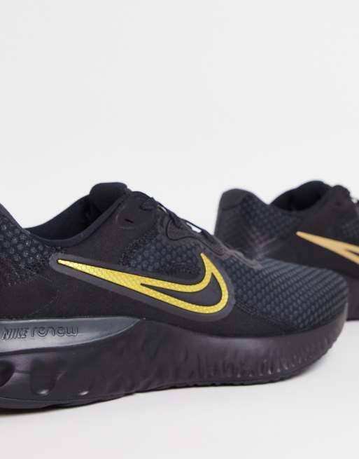 lezing gewoon Gestreept Nike Running Renew Run 2 sneakers in black/metallic gold | ASOS