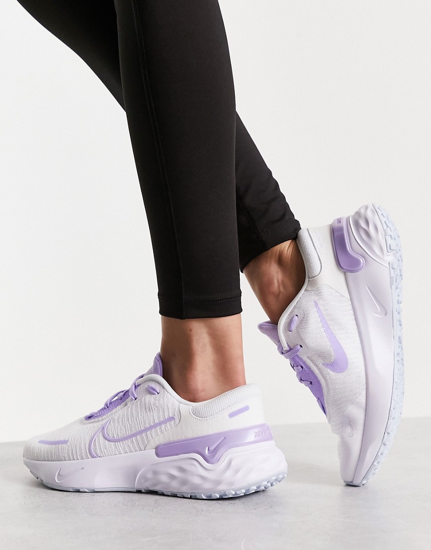 Nike Running Renew Run 4 trainers in white and purple