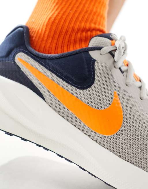 Nike gray and orange shoes online