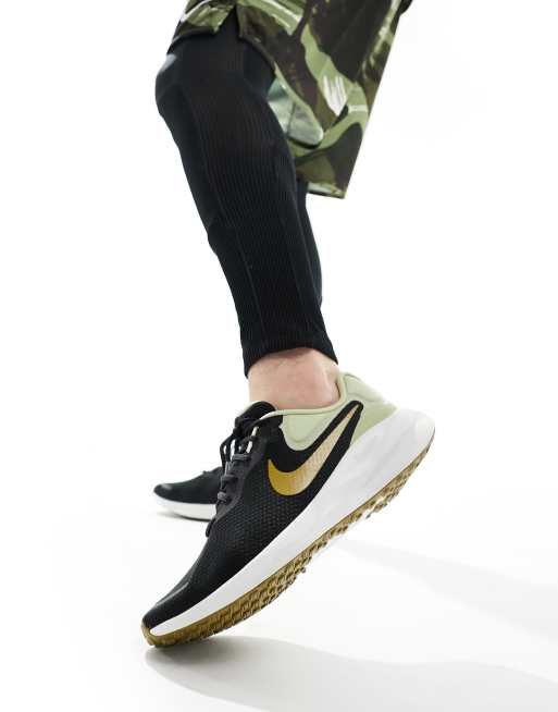 Nike zwart online goud