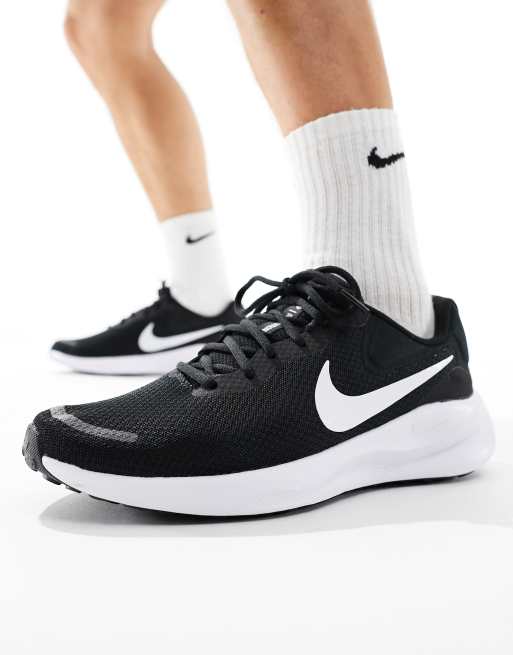 Nike Running Revolution 7 trainers in black and white