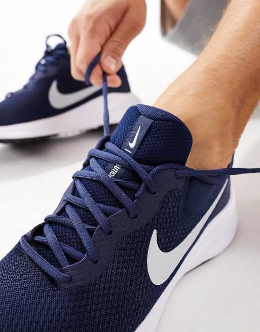 Nike Running Revolution trainers in navy and white ASOS