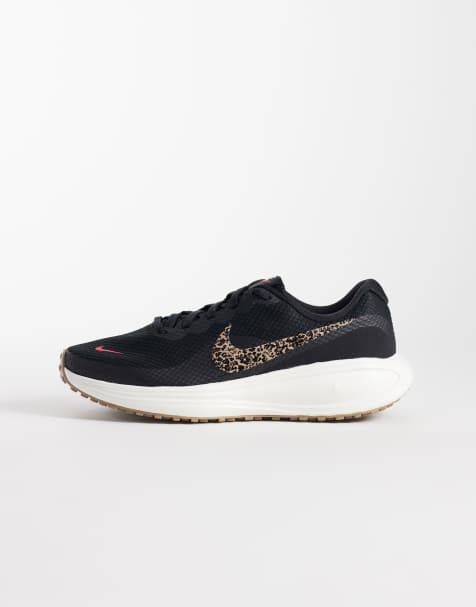 Nike Running Revolution 8 buty sportowe w czerni i we wzór zwierzęcy - view 1