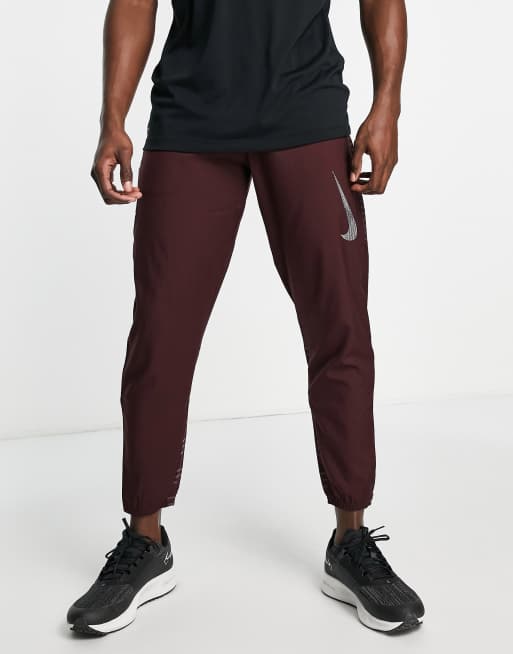 Nike Running - Run Division Challenger Dri-FIT - Joggers bordeaux