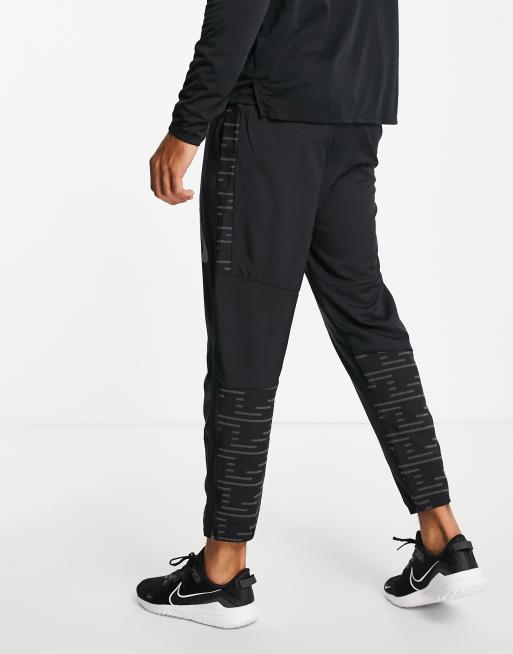 Under Armour Challenger Pro joggers in black and blue