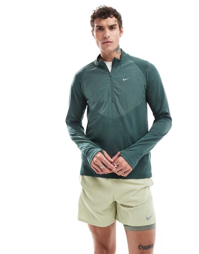 Nike Running - run division element 1/2 zip sweatshirt in dark green