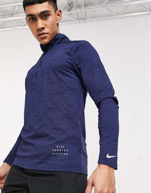 Nike Running Run Division Element 1/4 zip top in navy | ASOS