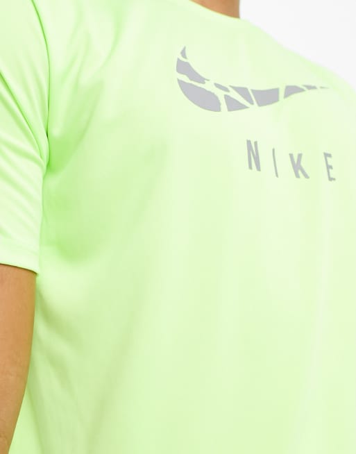 navy blue and neon green nike shirt