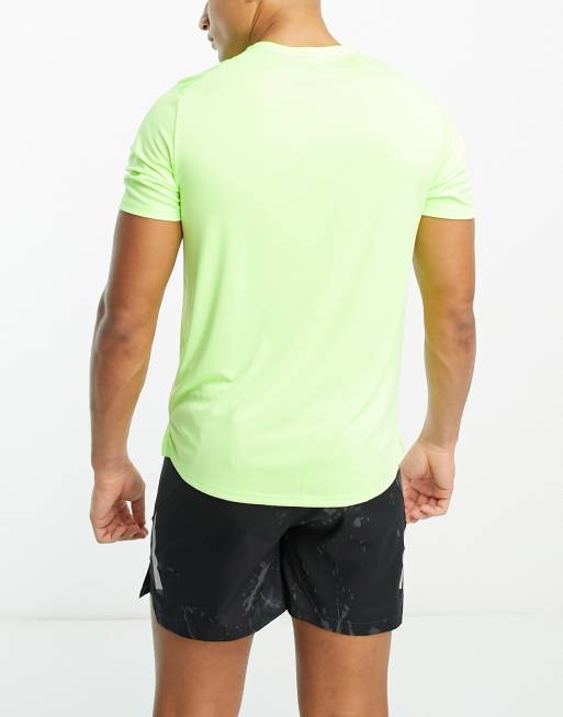 navy blue and neon green nike shirt