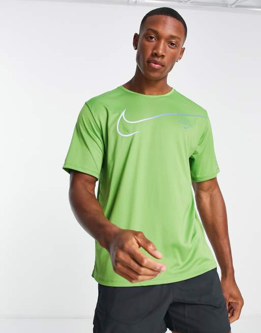 Nike Running Run Division Miler Swoosh t-shirt in green | ASOS