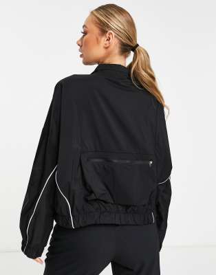 Nike Running Run Division packable jacket in black | ASOS