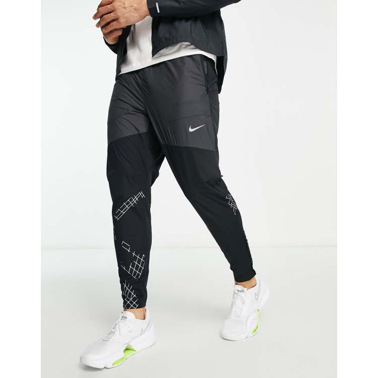 Nike Running Run Division Phenom Elite Flash reflective joggers in black