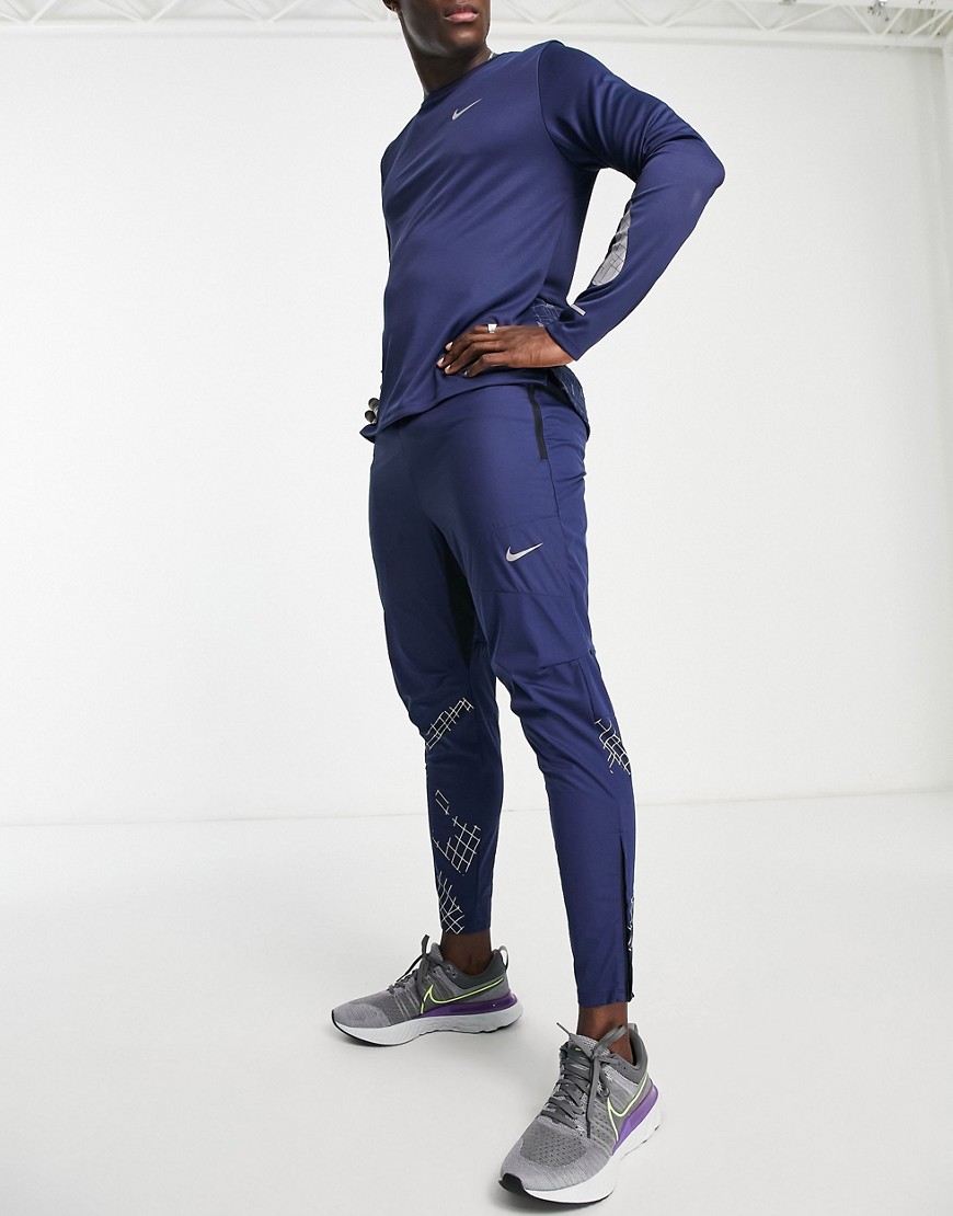 Nike Running Run Division Phenom Elite Flash reflective joggers in navy