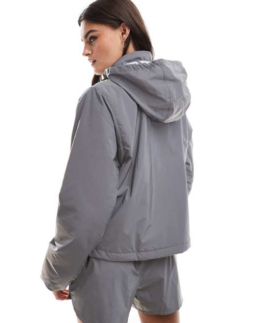 Nike Running Run Division reflective jacket in silver | ASOS