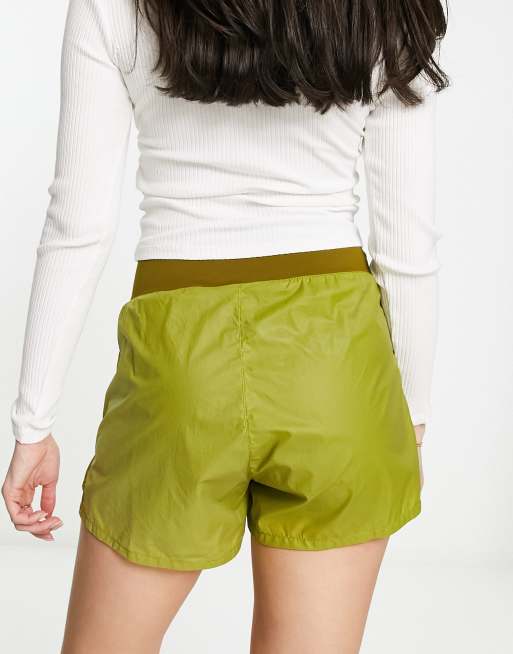 Nike Running Dri-Fit legging shorts in khaki