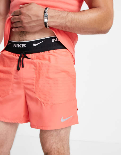 Peach hot sale nike shorts