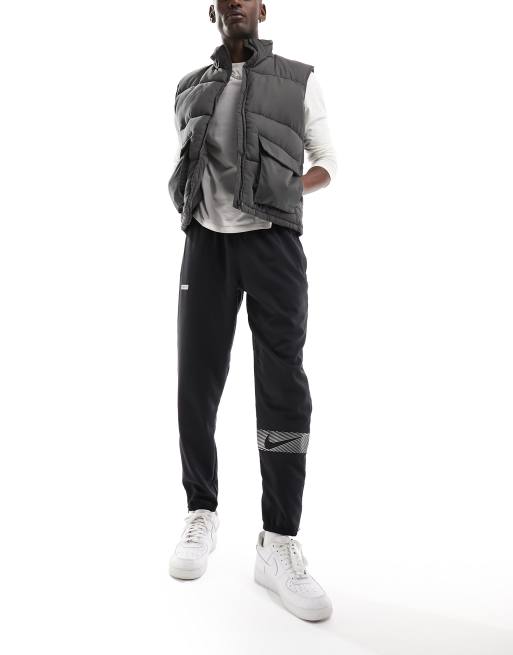 Nike Running Run Divison Challenger flash woven jogger in black ASOS