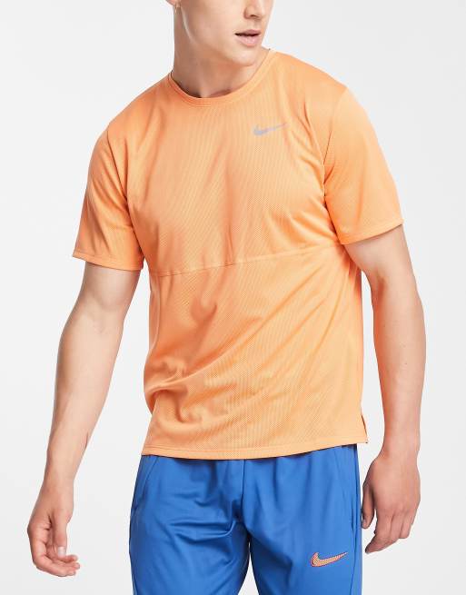 Nike Running Run Dri FIT t shirt in peach