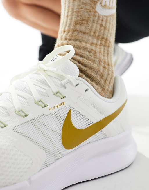 Nike gold and white sneakers best sale