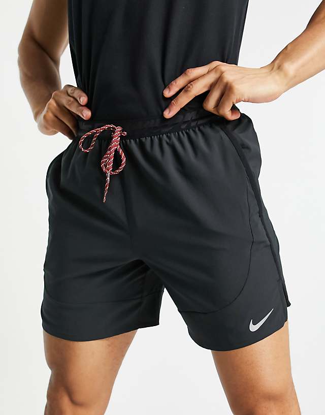 Nike Running Run Wild Flex Stride 7 inch shorts in black | ASOS