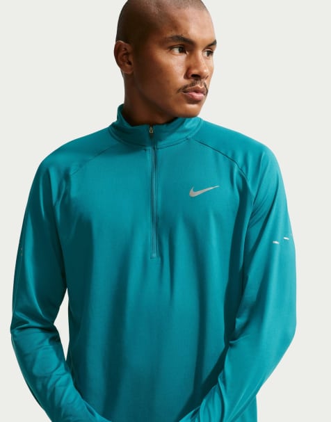 Nike Running Stride Dri-FIT 1/2 zip mid layer in blue - view 1