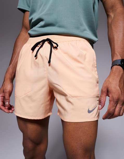 Nike Running Stride Dri-FIT 5 inch shorts in orange - view 1