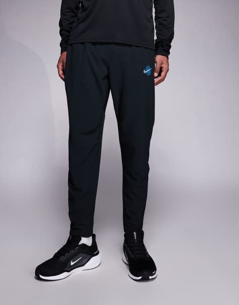 Nike Running Stride Dri-FIT woven trousers in black - view 1