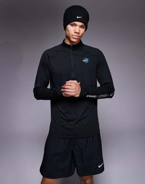 Nike Running Stride Energy Dri-FIT half zip long sleeve top in black - view 1