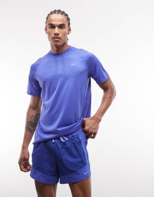 Nike Running - Stride - Short 5 pouces en tissu Dri-FIT doublé - Bleu