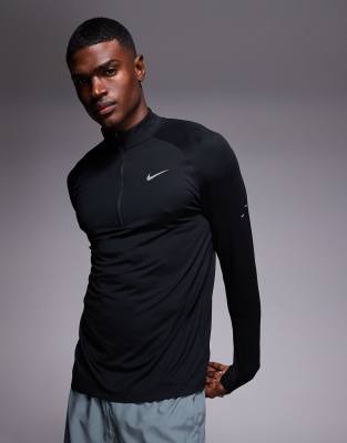 Nike Running - Stride - Top à manches longues et col zippé en tissu Dri-FIT - Noir
