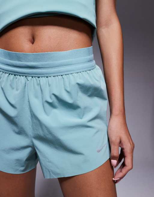 Nike Running Swift Dri-Fit mid rise 2.5 inch shorts in light blue, 2 of 5