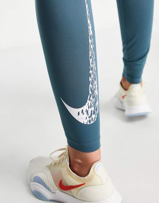 Nike Running Swoosh Dri-FIT 7/8 leggings in blue ASOS