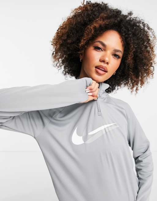 Nike swoosh half zip sale