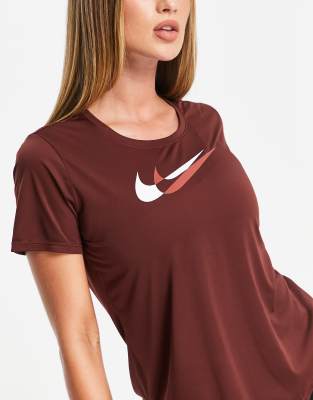 bronze nike shirt