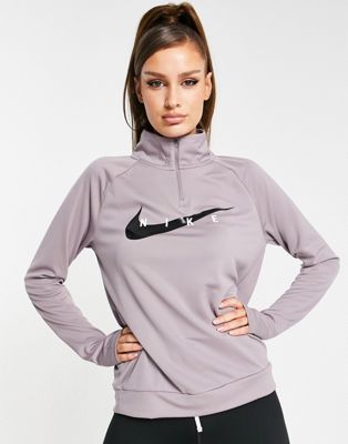 Nike Running Swoosh half zip mid layer top in purple | ASOS