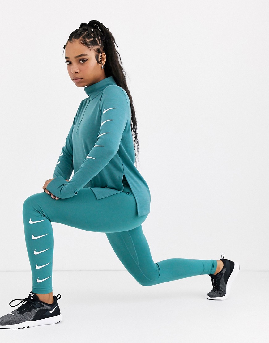 Nike Running swoosh leggings in teal blue