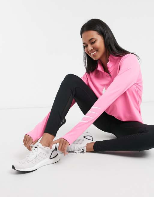 Nike running swoosh logo quarter zip top best sale in pink