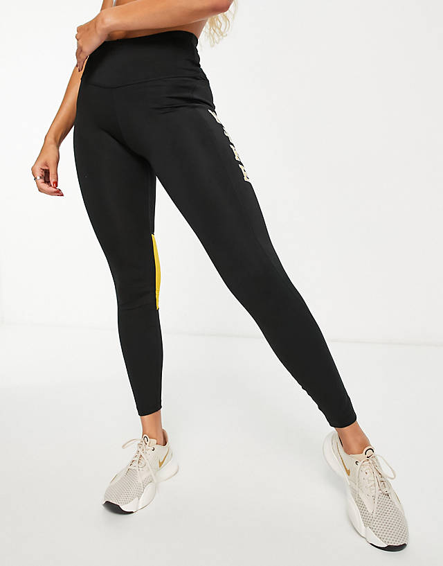 Nike Running - swoosh run fast dri-fit heritage logo 7/8 leggings in black