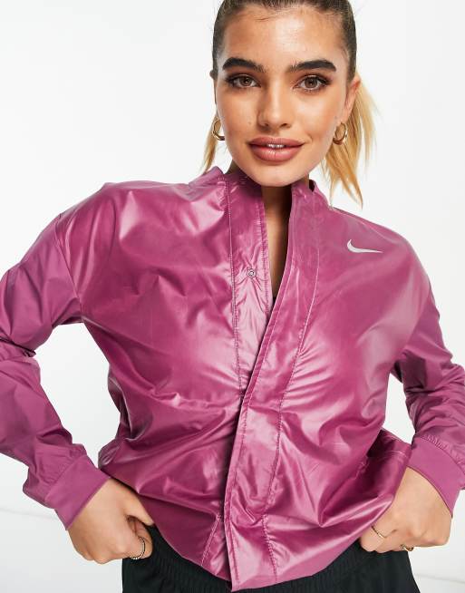 Richtlijnen Egomania slim Nike Running Swoosh Run jacket in pink | ASOS