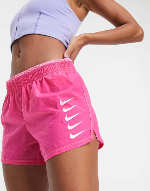 Nike Running swoosh shorts in pink | ASOS