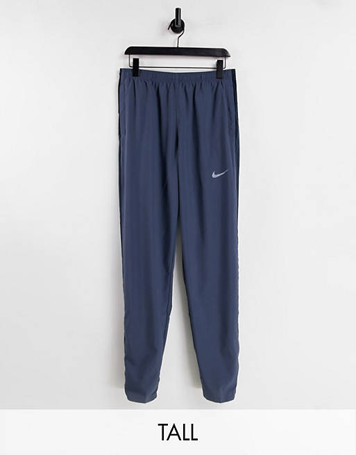 Nike Running Tall Dri-FIT woven joggers in dark blue