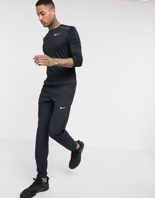 Nike Running Tall stripe joggers in black