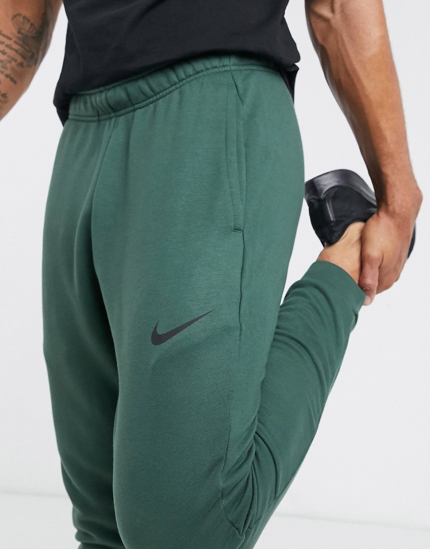 Nike Running tapered fleece joggers in khaki-Green