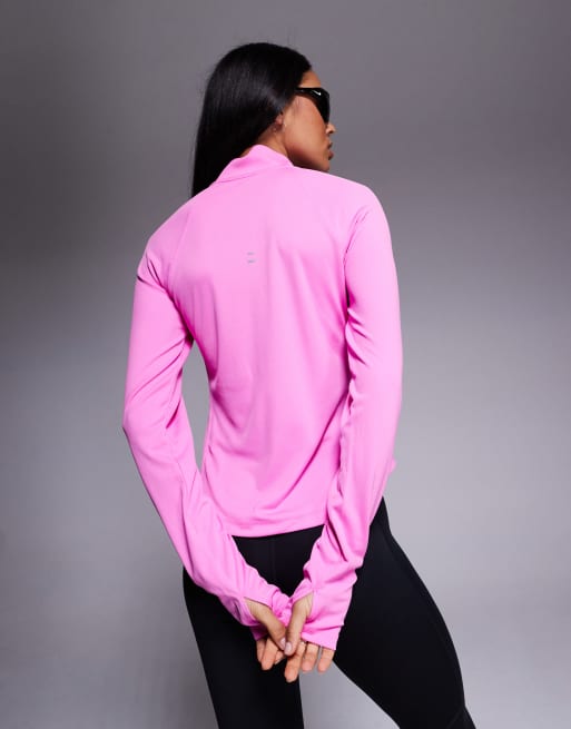 Nike Running Tempo Dri-FIT half zip long sleeve t-shirt in pink