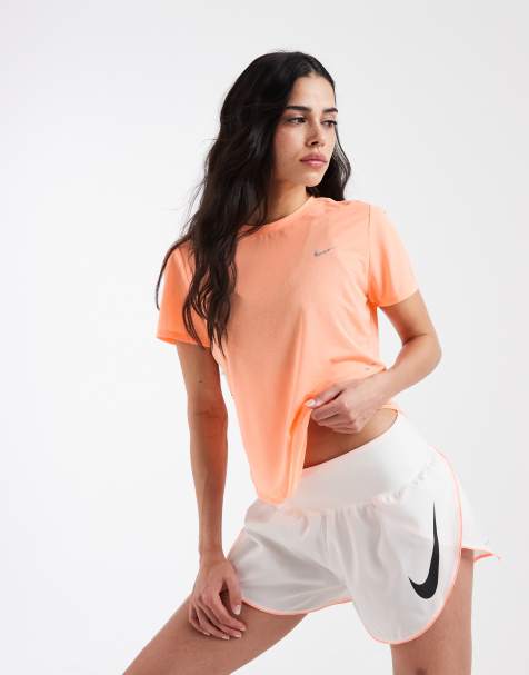 Nike Running Tempo Dri-FIT mid rise swoosh shorts in white